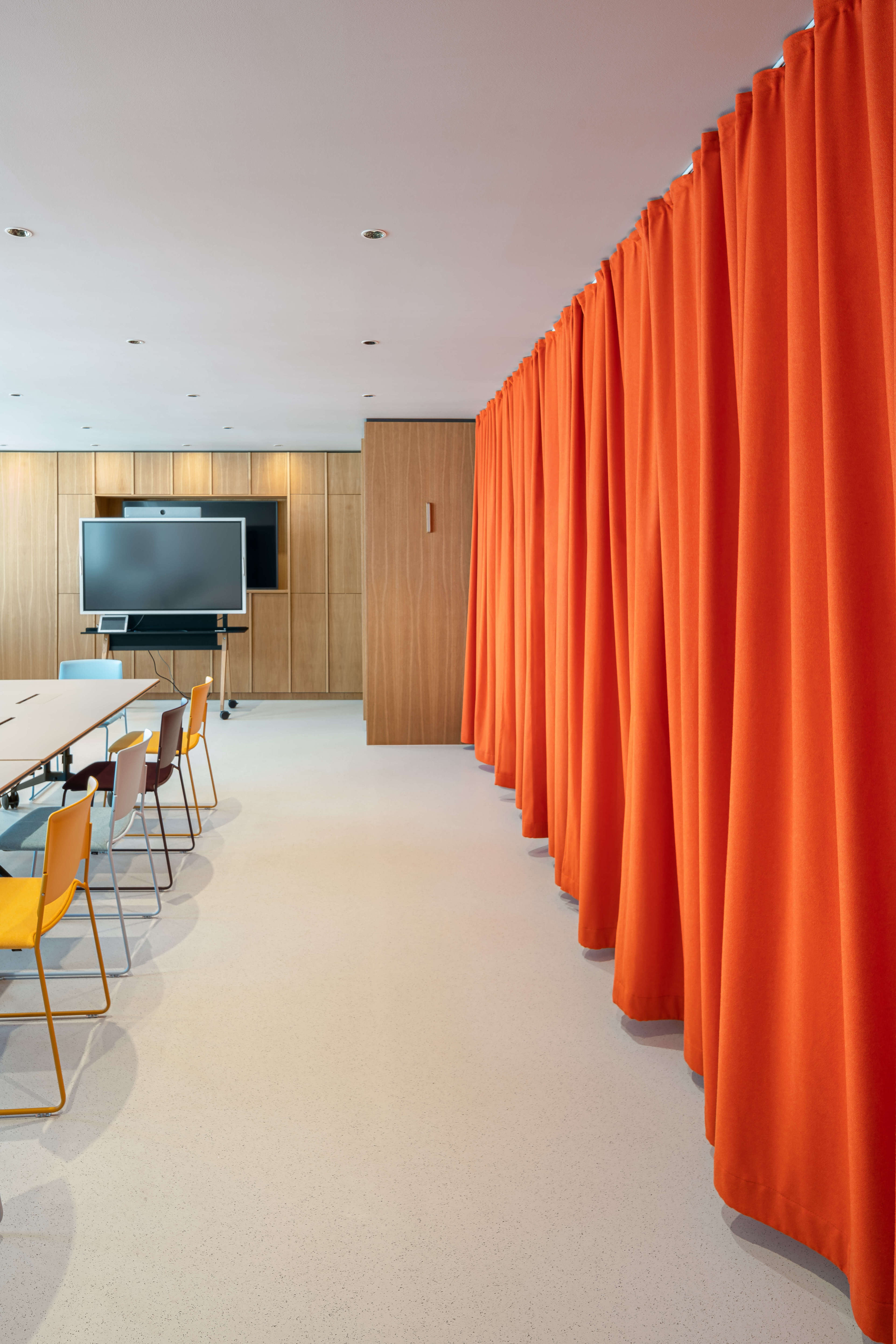 Acoustic fabric curtains in a meeting room